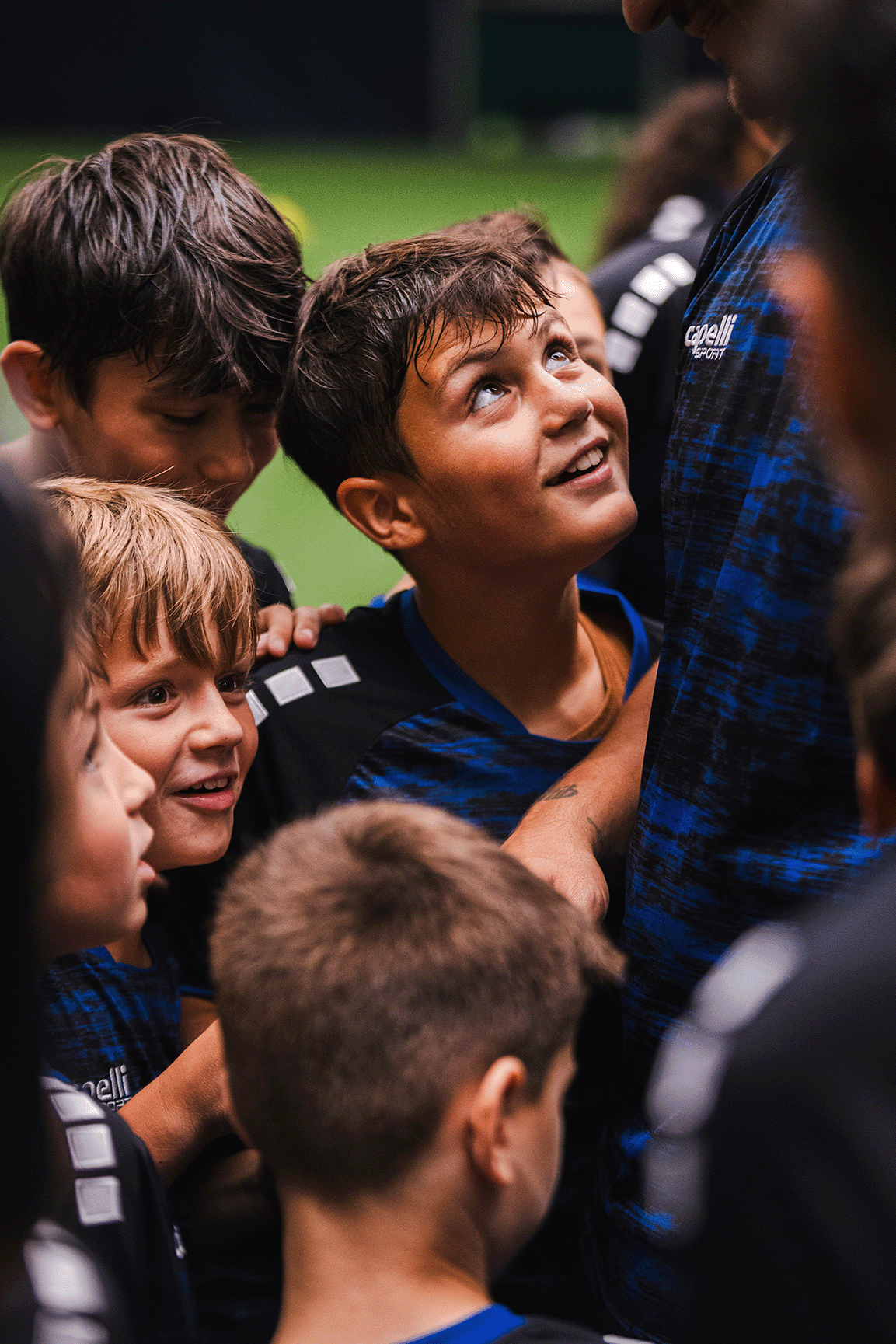 Trainer mit Kindern in der Academy
